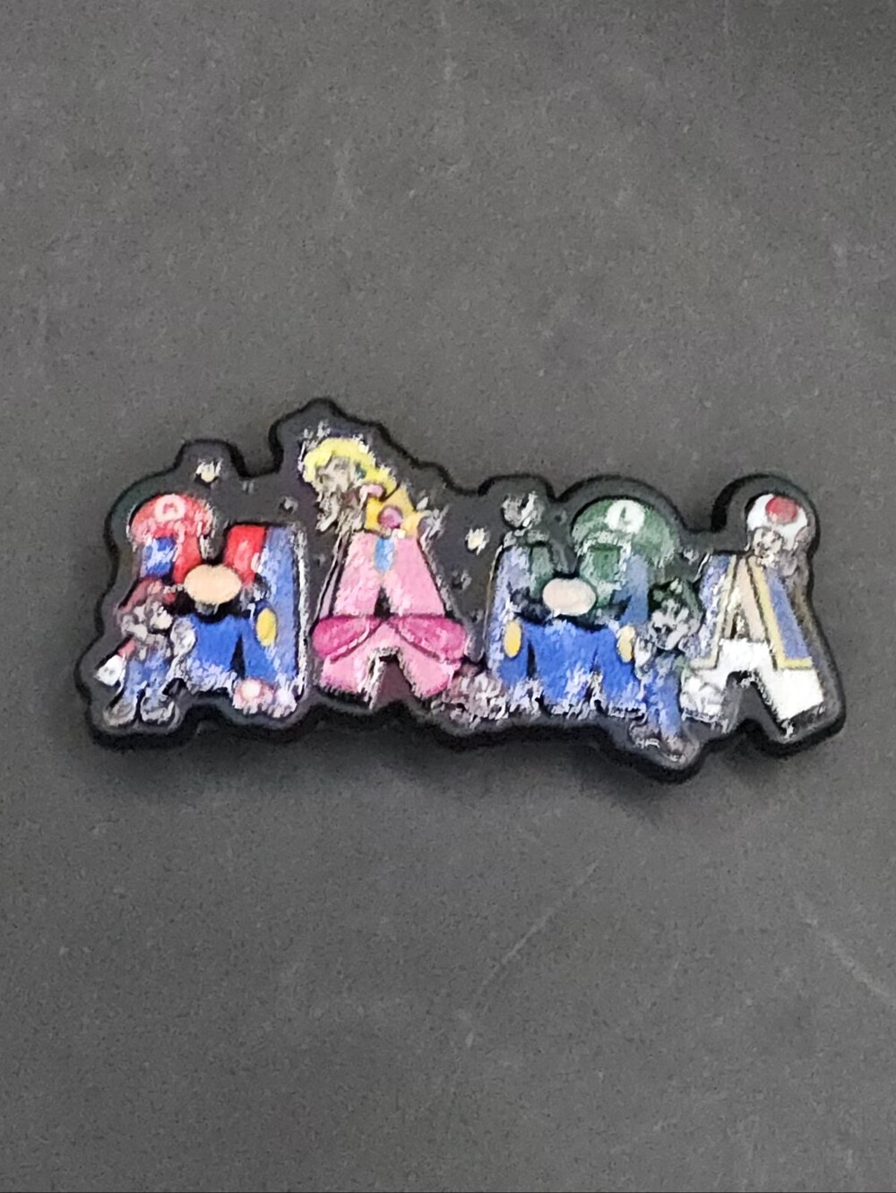 (5/$15) Mama in Super Mario Theme Croc Charm